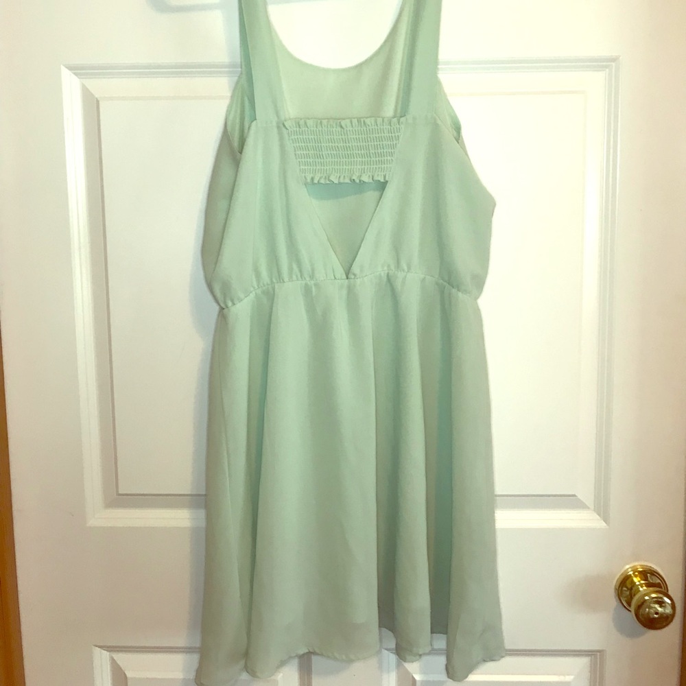 H&M mint green dress with peek-a-book back